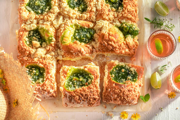 istock Tasty gooseberry yeast cake served with lemonade. 1499135976