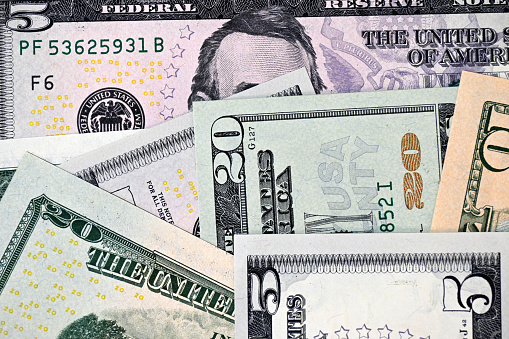Close up photograph of U.S. Savings Bonds, selective focus.