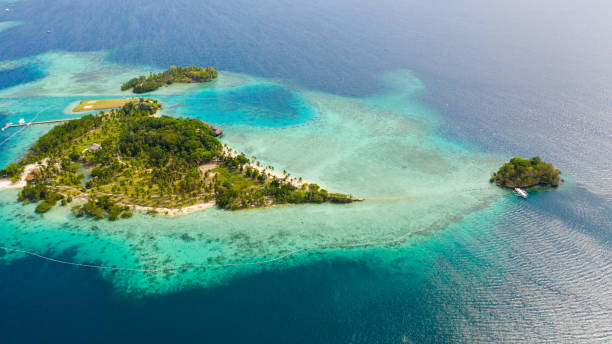 istock Tropical island with beach. Malipano island, Philippines, Samal. 1499138561