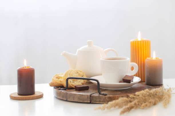 istock still life with burning candles in white modern interior 1499146658