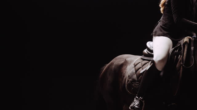 Girl Equestrian Rides Horse In Studio