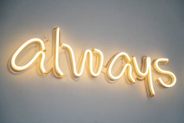 istock A yellow neon sign always on white wall at coffee shop. 1499150848