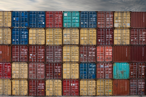 Stack of colorful cargo containers at the dock