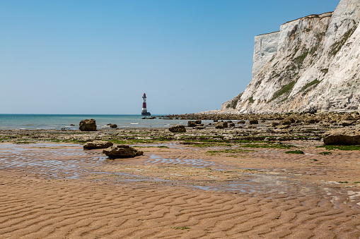 Low tide revealing a sandy beach, near Beachy Head Lighthouse off the Sussex coast