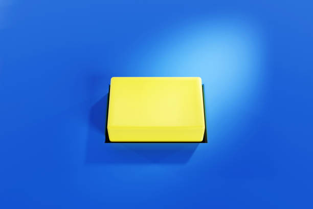 Yellow push button on the blue background