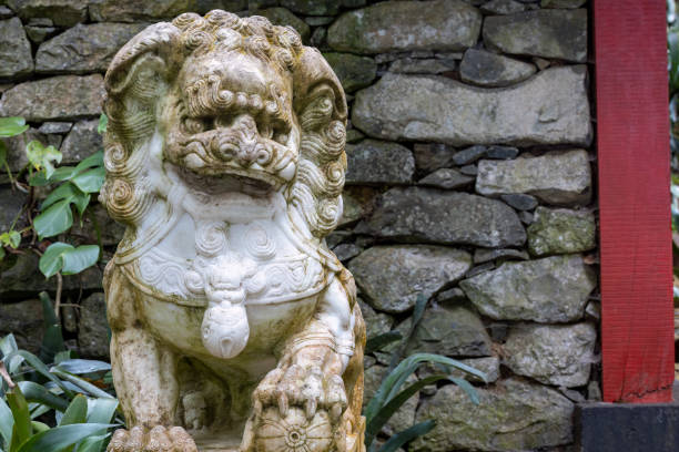 istock Asian lion sculpture in Madeira garden 1499159197