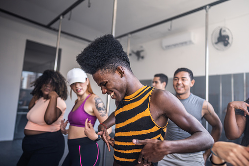 Young people dancing in a dancing class at a dance studio