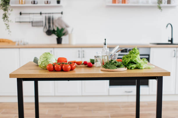istock Organic products for healthy diet on dining table at home 1499160311