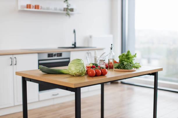 istock Organic products for healthy diet on dining table at home 1499160315