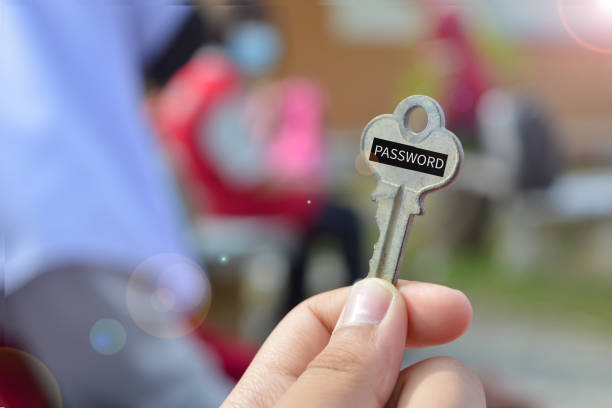 istock Hand holding key with text PASSWORD. Cyber security concept, data protection and secured internet access 1499162565