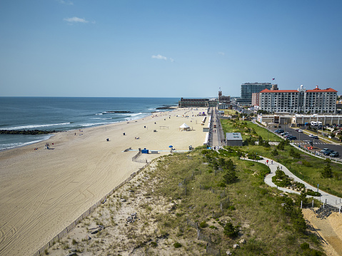 A drones view looking south at Asbury parks beach and boardwalk on a June Saturday morning.