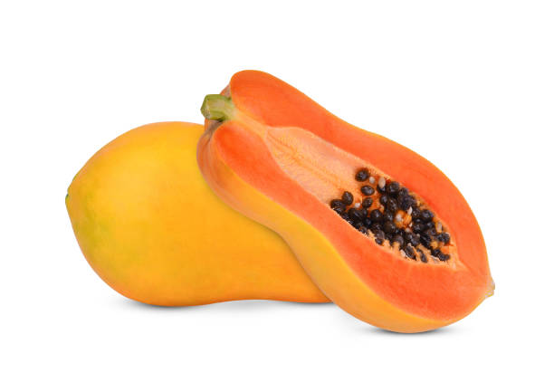 istock Slice of papaya fruit with seeds isolated on white 1499165731