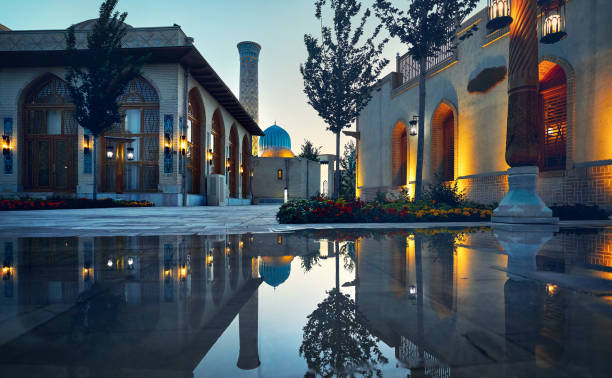 Samarkand Eternal city modern complex in Uzbekistan Samarkand Eternal city Boqiy Shahar Registan public square with mosque and minaret modern complex of ancient city with reflection and colorful illumination in Uzbekistan samarkand urban stock pictures, royalty-free photos & images