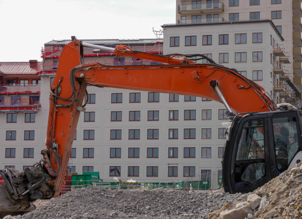 istock an excavator at a construction site in the summer 1499172171