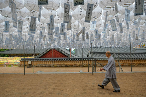 Busan, South Korea - May 30, 2023: A monk at the Beomeosa Temple, it is a Buddhist temple built on Geumjeongsan Mountain in Busan, South Korea.