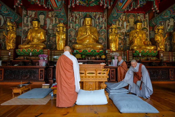Gimjesi, South Korea - June 6, 2023: Monks at Geumsansa Temple, it is a Buddhist temple located in Moaksan Provincial Park in Gimjesi, South Korea.