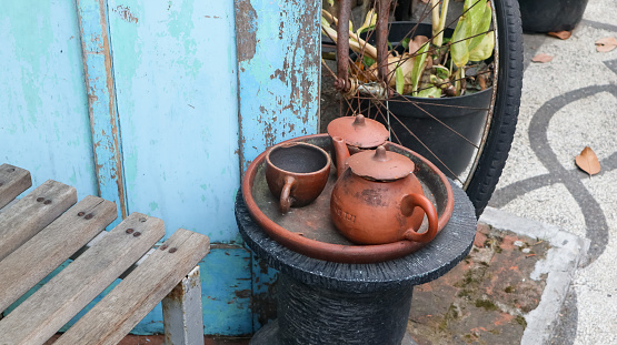 teapots and cups made of clay