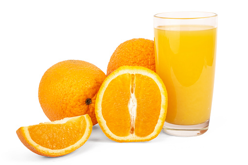 Fresh Squeezed Orange Juice and Oranges on a white background