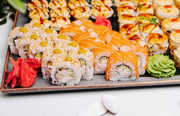 istock Warm Sushi Roll with Salmon, tuna and Cream Cheese 1499184348