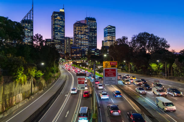 Sydney, Australia - April 20, 2022: Cahill Expressway with cars in traffic during peak hour at dusk. It is an urban freeway in Sydney and was the first freeway constructed in Australia