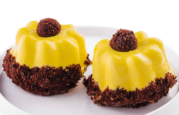 istock dessert in yellow icing on plate 1499186762