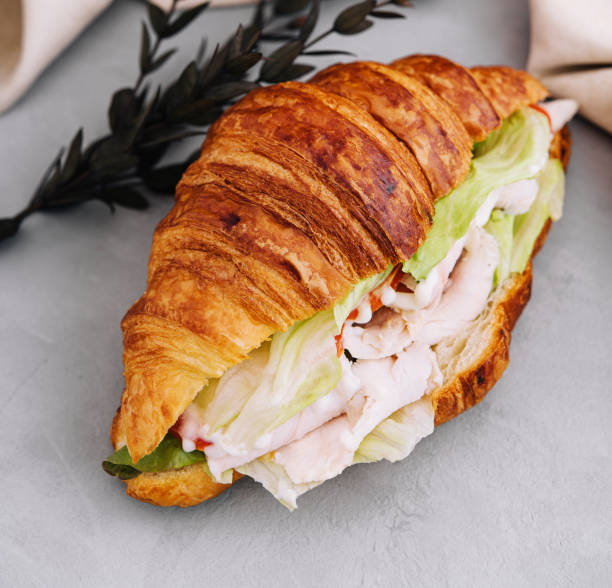 istock croissant brioche bread with chicken breast and vegetable 1499189378