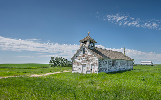 Abandoned wooden Saint John’s Catholic Church near the city of Havre, Montana, USA