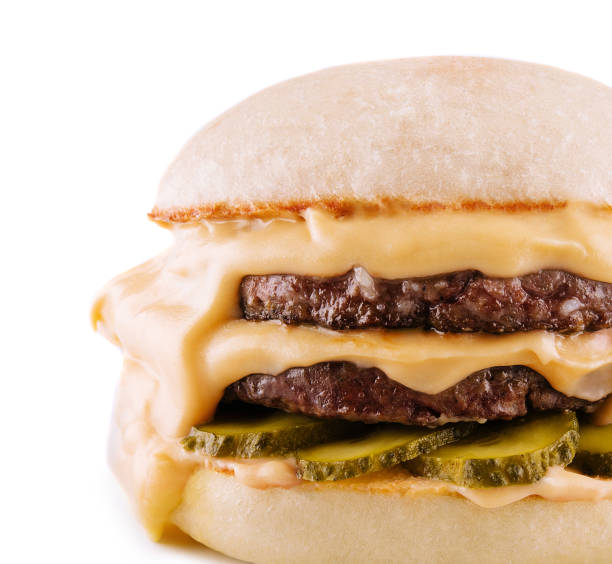 istock hamburger with two cutlets, pickled cucumbers and melted cheese 1499189801
