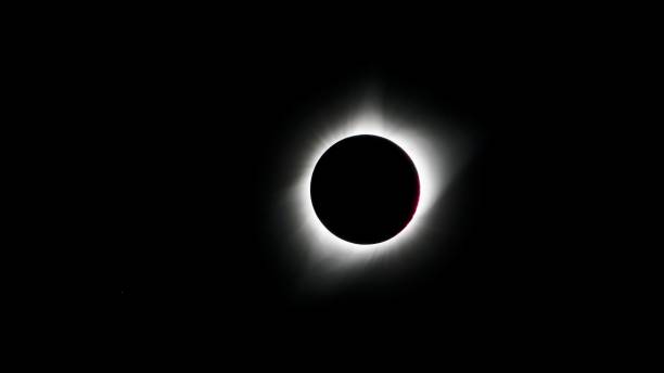 istock Beautiful night sky lit up by a glowing solar eclipse - perfect for wallpapers 1499189879