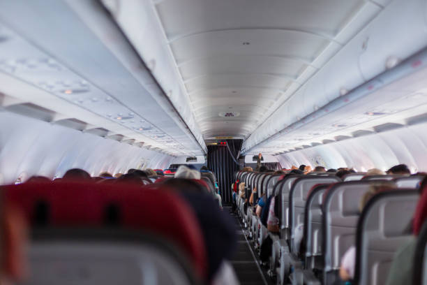 istock Commercial airliner cabin 1499189961