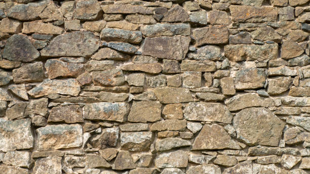 istock Beautiful texture vintage stonework from natural stone. High detail 1499190697