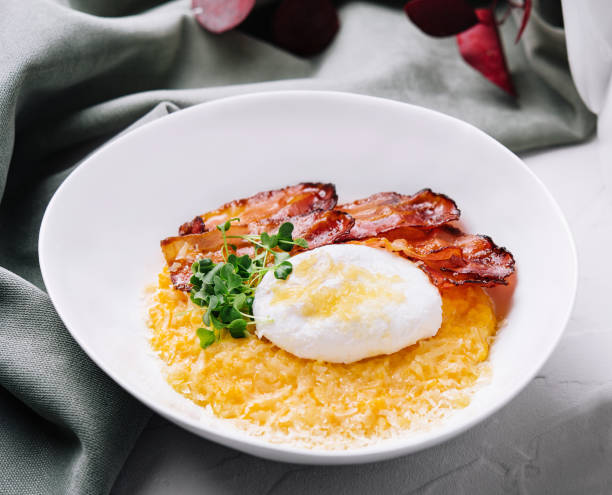 istock breakfast barley porridge with bacon and a poached egg 1499191038