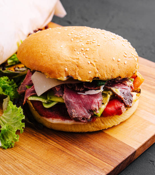 istock burger with jerky meat with fries 1499191347