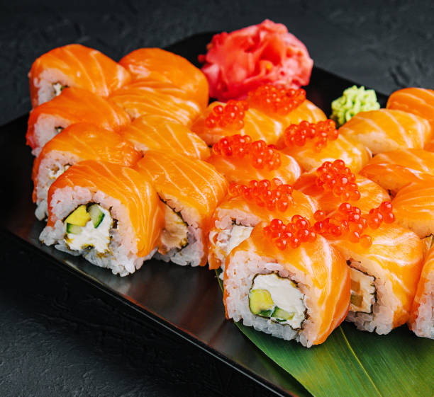 istock Philadelphia roll sushi with salmon, prawn, avocado, cream cheese 1499194665