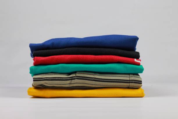 istock Collection of colorful plain t-shirts 1499210120