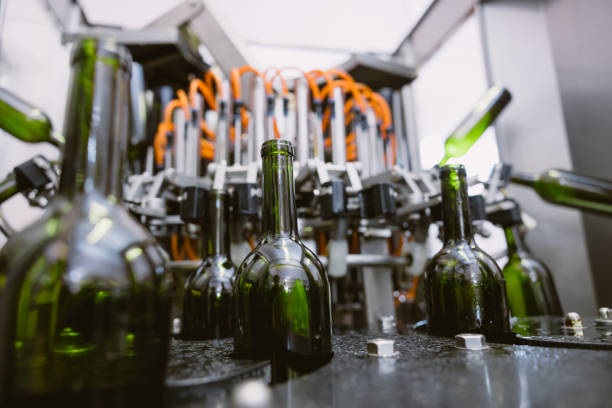 istock Drink Beverage or Winery Brewery factory production line, Bottle cleaning machine process. 1499212748
