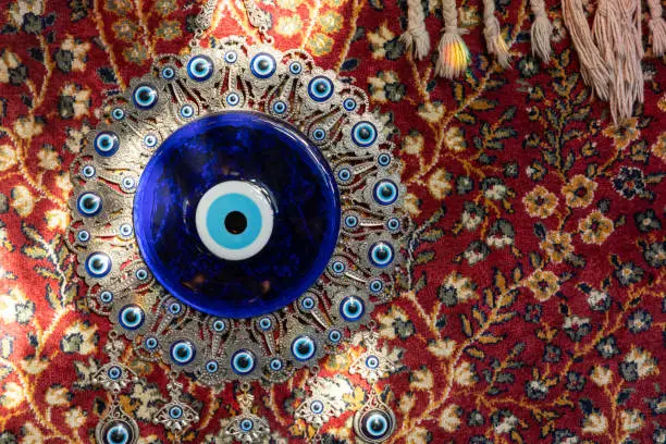 Photo of The Blue Turkish Evil Eye Nazar Amulet or Nazar Boncugu blue sapphire charm souvenir from Turkey