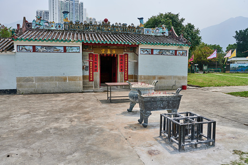 Exterior view of Hau Wong Temple, a structure built in 1765, dedicated to Yeung Hau, a court official of the Song Dynasty. Tung Chong. Islands District. Lantau Island. Hong Kong.