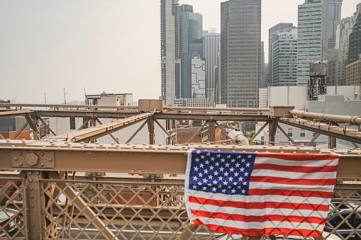 American National Flag Hanged on Brooklyn Bridge in New York city.