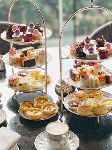 British afternoon tea: sandwiches, scones, pastries and cakes