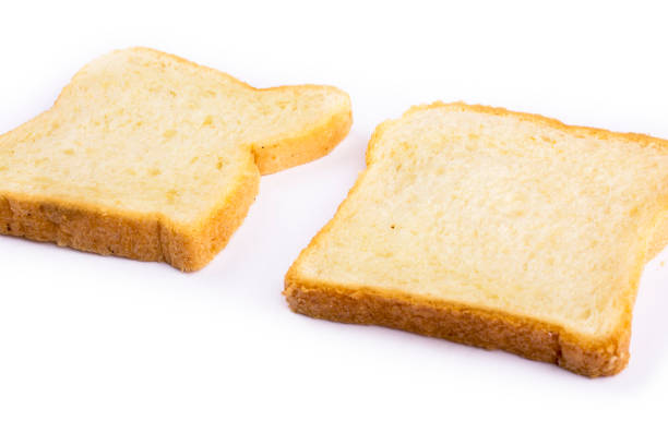 istock Slices of bread for toasting on a white background 1499214911