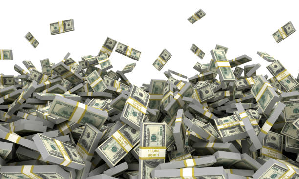 istock Falling money in a large pile US dollars 1499215917