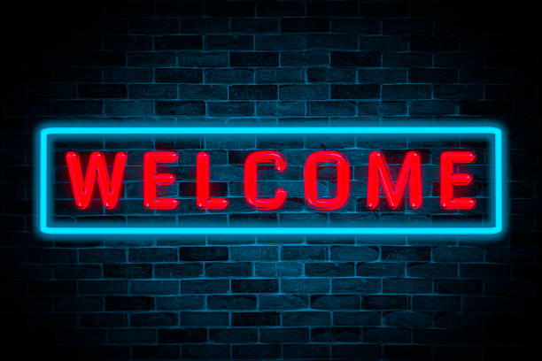 istock Welcome neon banner on brick wall background. 1499215963