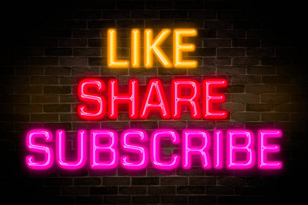 istock Like, Share, Subscribe neon banner on brick wall background. 1499215982