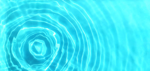 istock Water background. Blue water texture, surface of blue swimming pool. Spa concept background. Flat lay, top view, copy space 1499226113