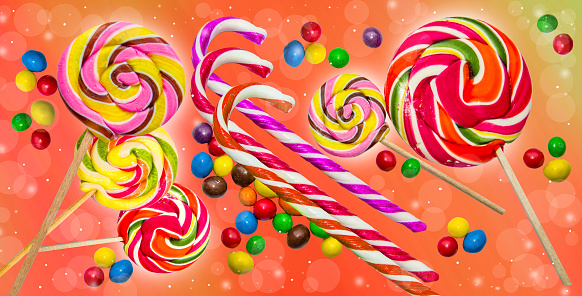 Candy background. Sweets on a yellow background.