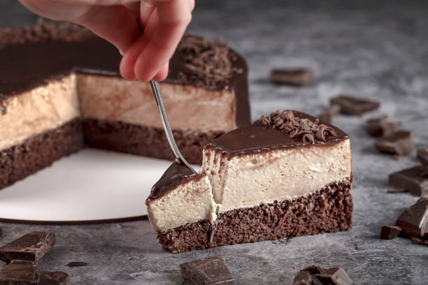 istock Classic mousse cappuccino cake on a gray background decorated with chocolate 1499231691