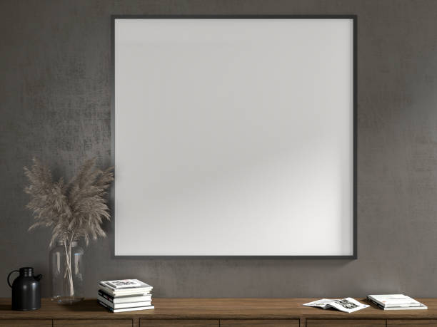 istock Large blank white poster frames black frames on a dark gray concrete wall, low wooden cabinets, books, and vases in an elegant apartment interior. 3D rendering 1499231851