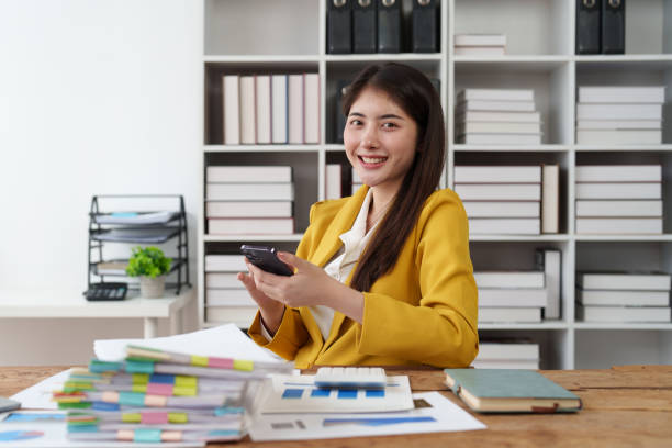 Beautiful Businesswoman completes KYC using an online banking program in order to open a digital savings account. The definition of cyber security Beautiful Businesswoman completes KYC using an online banking program in order to open a digital savings account. The definition of cyber security. ppp-program stock pictures, royalty-free photos & images