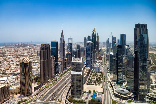 istock Panoramic cityscape district Dubai modern skyscrapers sunny summer day. Urban background aerial view of UAE city business new towers. Construction and modern architecture concept. Copy ad text space 1499232351